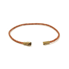 Men's caramel brown thin leather bracelet with a magnetic closure.  Easy to put on yourself since the closure is magnetic.  The safety lock ensures it'll stay on the wrist.   Available in sizes for tiny wrists and XL for men.  Also, available in a range of colors.  Chains by Lauren