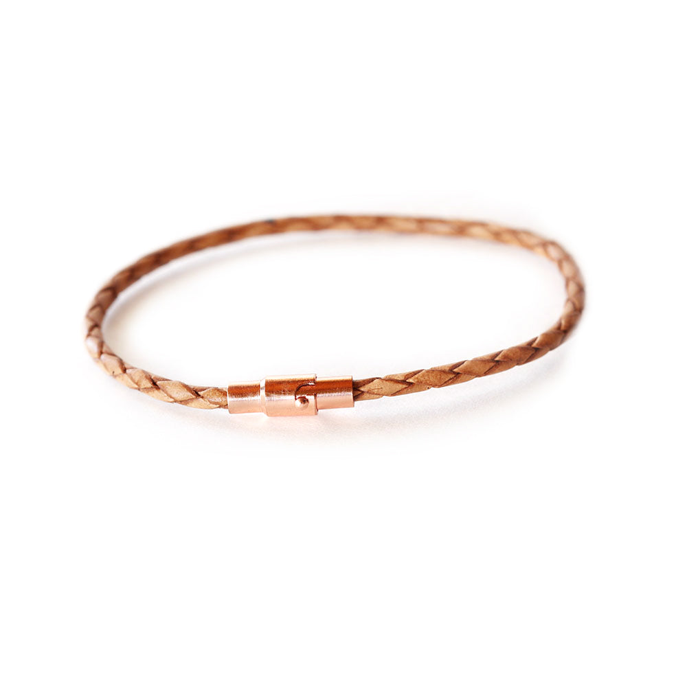 Thin leather bracelet with magnetic closure and safety lock. Chains by Lauren.