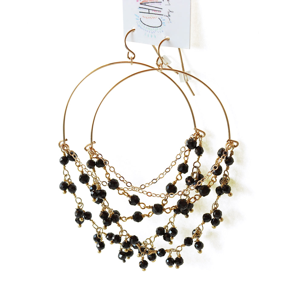Gold chandelier hoops.