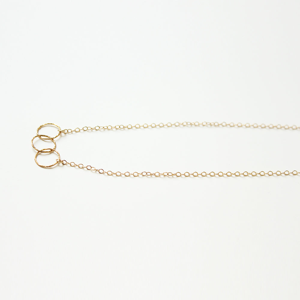 Dainty and delicate 3 ring gold necklace.  Handmade.  Chains by Lauren