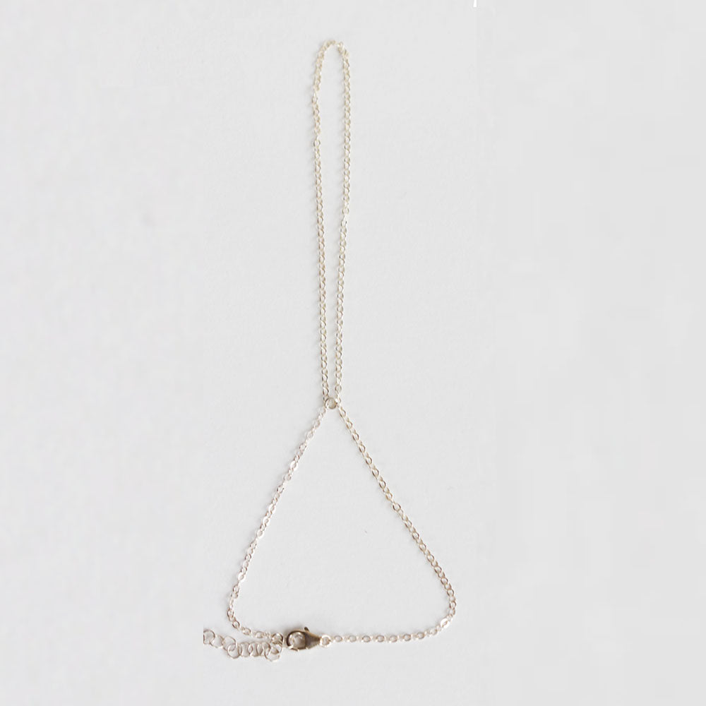 Simple silver handchain bracelet made with sterling silver. Adjustable so one size fits all. Handmade. Chains by Lauren