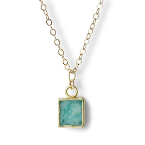 Elevate your jewelry collection with our exquisite 14K Gold Filled Amazonite Charm Necklace, a masterpiece of understated elegance and versatility. 