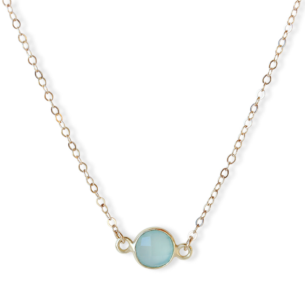 Introducing our 14K Gold Filled Chalcedony Stone Necklace, a captivating piece that celebrates the ethereal beauty and mystical properties of the chalcedony stone. 