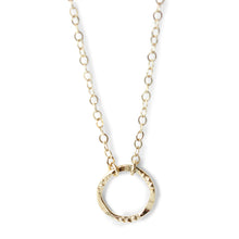Discover the epitome of modern elegance with our 14K Gold Filled Hammered Circle Necklace, a piece that effortlessly fuses contemporary design with classic charm.