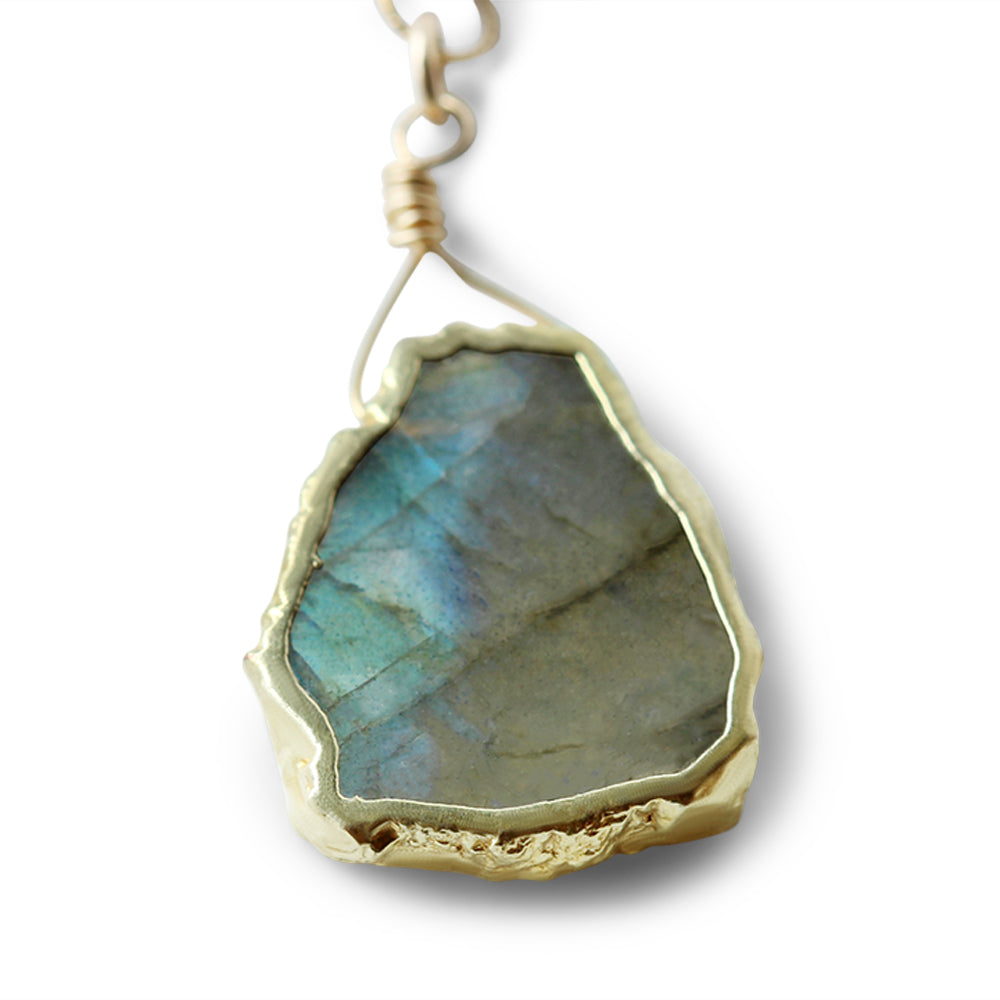Step into the world of mystique with our 14K Gold Filled Labradorite Necklace.  Each piece is thoughtfully handcrafted to highlight the iridescent beauty of labradorite, a stone known for its mystical properties.