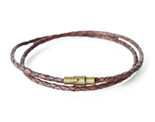 Men's dark brown leather wrap bracelet with a magnetic closure.