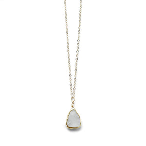 Discover the celestial charm of our 14K Gold Filled Moonstone Necklace and let its mystical powers enhance your look with grace and elegance.