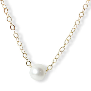 Elevate your jewelry game with our exquisite 14K Gold Filled Pearl Necklace, a timeless piece that exudes classic elegance and charm.