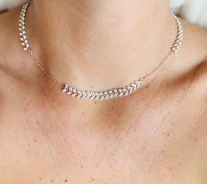 This white Grecian necklace in adjustable at the back neckl.