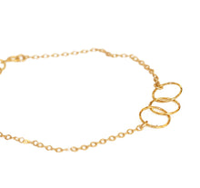 This dainty gold stacking bracelet is made from gold filled chain.  The dainty and delicate 3 ring gold charm bracelet.   Chains by Lauren