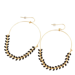 These Grecian hoop earrings are available in a range of colors. Chains by Lauren