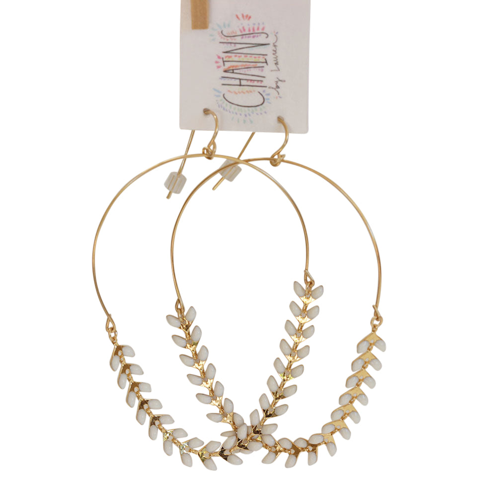 These Grecian earrings are made of gold filled wire and enamel. The perfect contemporary hoop. Available in silver as well. Chains by Lauren