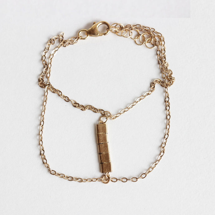 This gold layering bracelet is made of gold fill.  It's adjustable so one size fits all.  Handmade.  Chains by Lauren