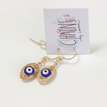 Evil eye earrings with gold filled ear wires.  Chains by Lauren