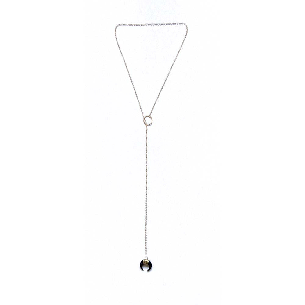 Black horn lariat.  Made from gold fill chain and the black charm is carved out of bone.  Chains by Lauren