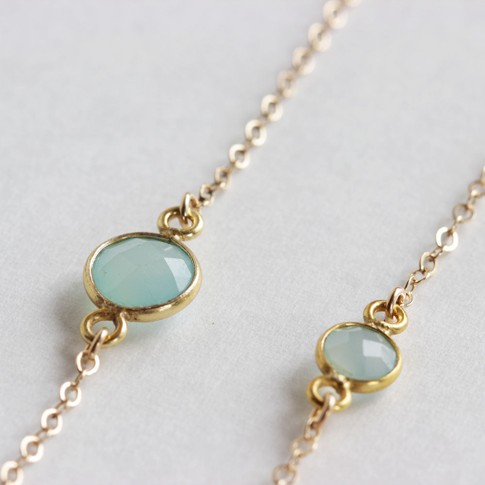 Close up of the Mother and daughter chalcedony bracelet set.  The mother wears the larger stone and the daughter wears the smaller stone.  Perfect for mother and daughter jewelry.  Found on chainsbylauren.us.  Handmade.  Chains by Lauren