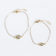 Matching mother and daughter labradorite bracelet set made from labradorite stone and gold fill chain. The mother wears the larger stone and the daughter wears the baby labradorite stone. Choose from a rang of sizes for a 1 to 10 year old. Handmade with love. Chains by Lauren  