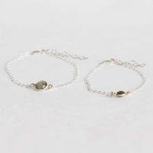 The cutest momma and me bracelet set.  Matching mother and daughter bracelets are made with  sterling silver and labradorite stones.  The range of sizes for the daughter is for a 1-10 year old.  Also available in gold.  Handmade.  Chains by Lauren