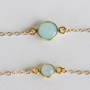 Close up of the Mother and daughter chalcedony bracelet set. The mother wears the larger stone and the daughter wears the smaller stone. Perfect for mother and daughter jewelry. Found on chainsbylauren.us. Handmade. Chains by Lauren