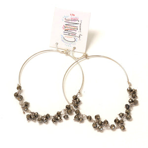silver beaded hoops made of pyrite stones and sterling silver.  Chains by Lauren