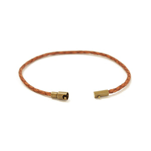 Women's caramel brown thin leather bracelet with a magnetic closure.  Easy to put on yourself since the closure is magnetic.  The safety lock ensures it'll stay on the wrist.   Available in sizes for tiny wrists and XL for men.  Also, available in a range of colors.  Chains by Lauren