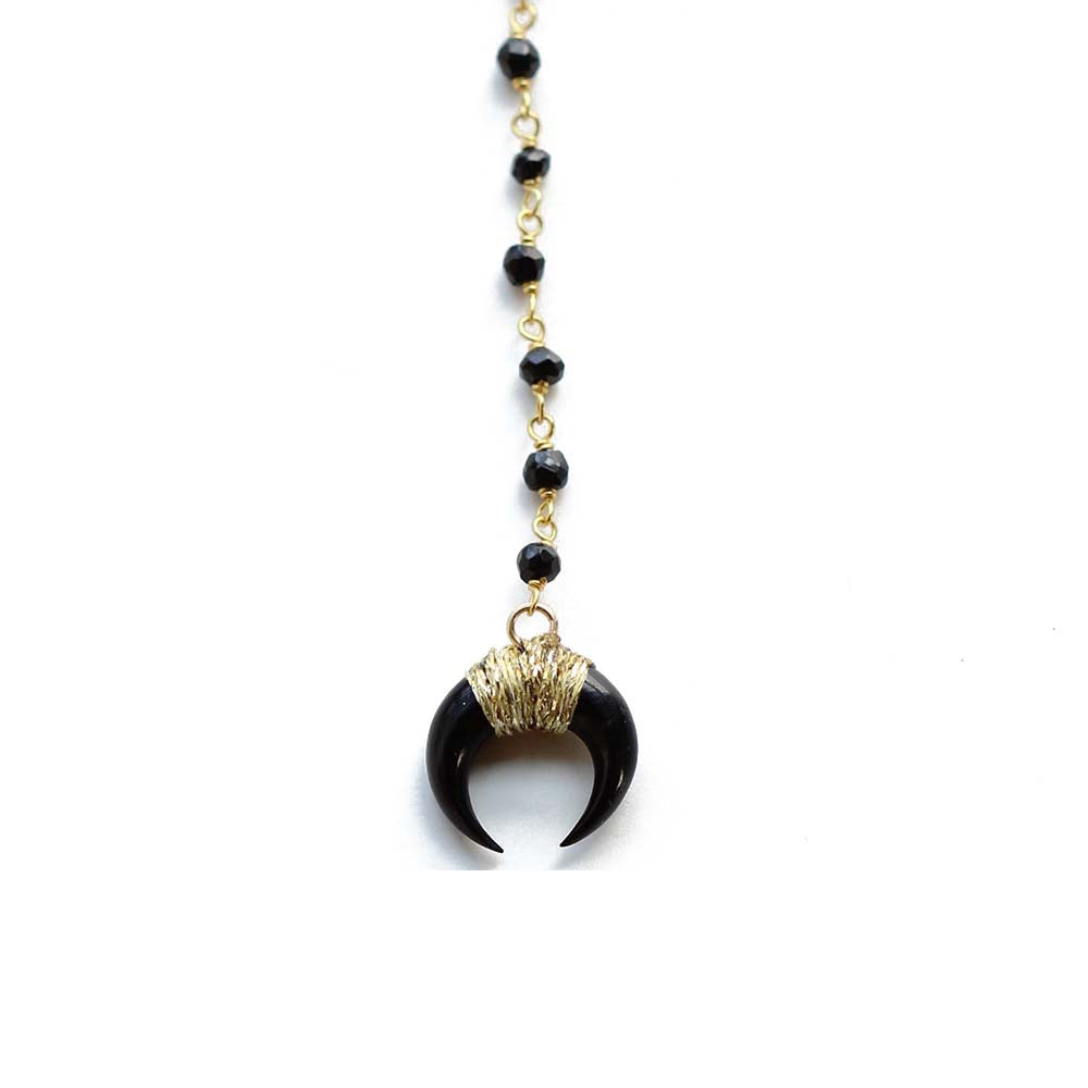Close up of the black horn carved from buffalo bone.  Chains by Lauren