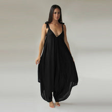 Black jumper with adjustable straps.  Made from super soft rayon voile.  Chains by Lauren