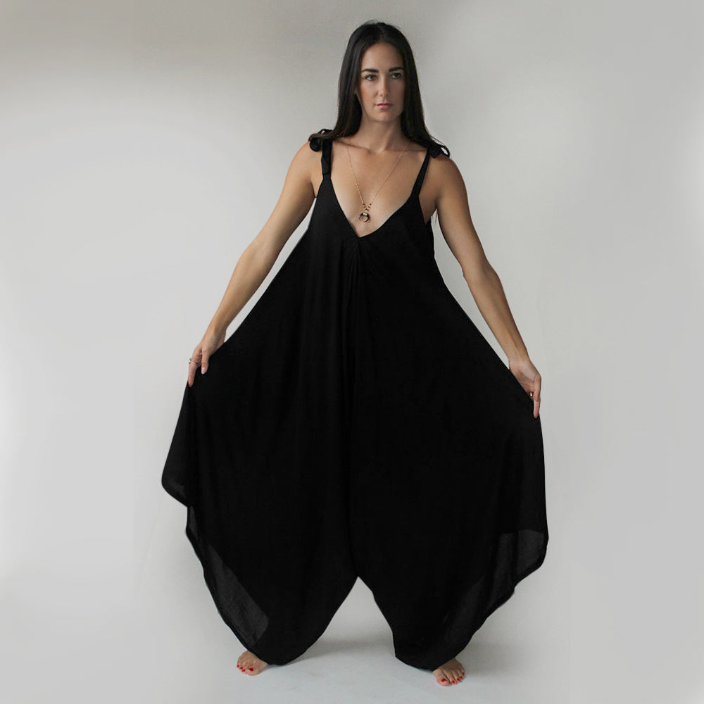 Super comfy romper.  The straps are adjustable.  Raise the neckline or drop it as you wish.  Or tie the straps at the back neck for a halter look.  Chains by Lauren