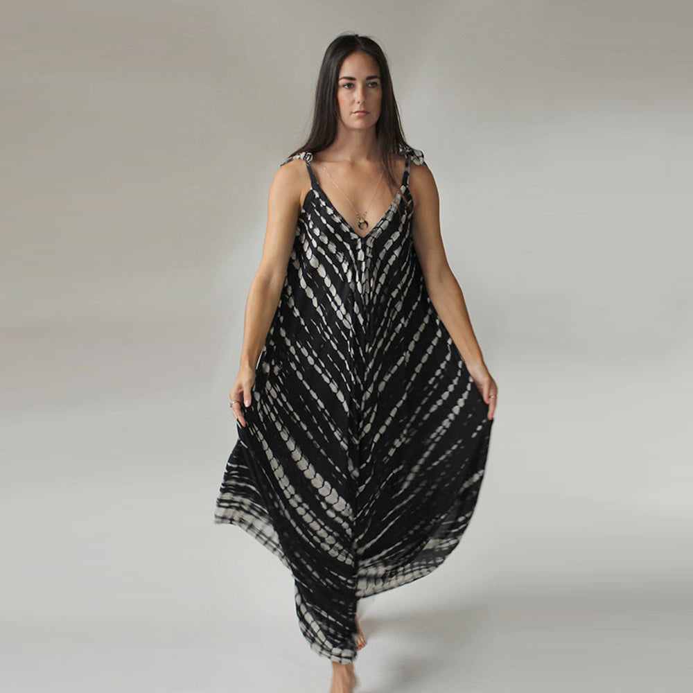 Super comfy black tie dye jumpsuit.  One size fits all.  Adjustable straps.  Chains by Lauren