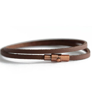 Unisex Brown Leather Wrap Bracelet.  Secures with a magnetic closure and safety lock.  Chains by Lauren