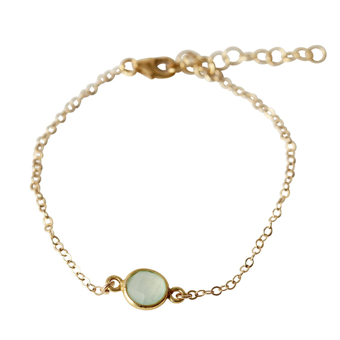 Wear it alone or stack it!  This  dainty gold stacking charm bracelet is made from gold filled chain and a chalcedony stone.  Chains by Lauren
