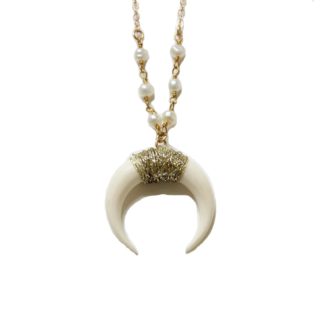 White horn necklace in a range of lengths from 18"-24".  Made with pearls, and gold fill chain.  Adjustable at the back neck.  Handmade.  Chains by Lauren