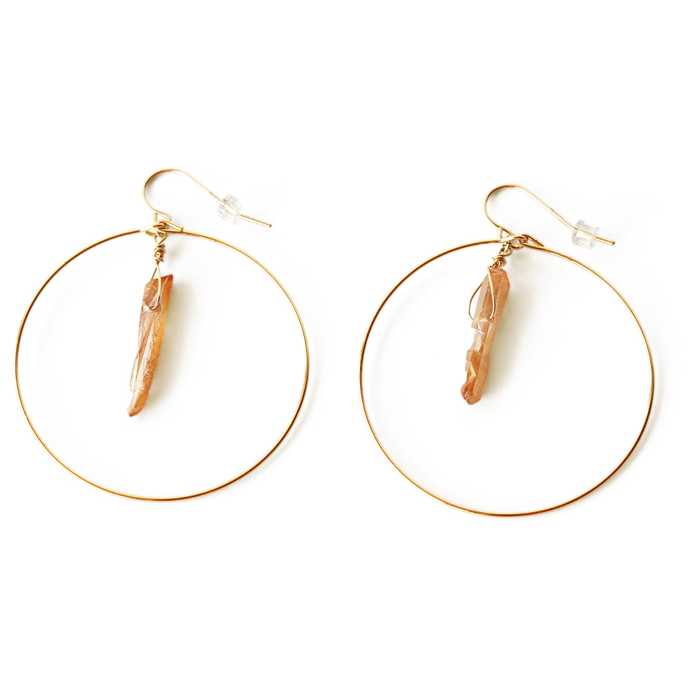 Crystal quartz plated in titanium hoops