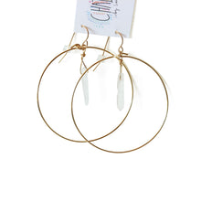 Crystal quartz gold hoops. Super light weight and the backings are included.