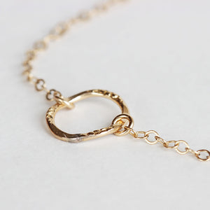 This dainty gold stacking bracelet is super simple and easy to wear daily.  Chains by Lauren