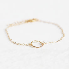 Dainty gold stacking bracelet found online at Chains by Lauren.