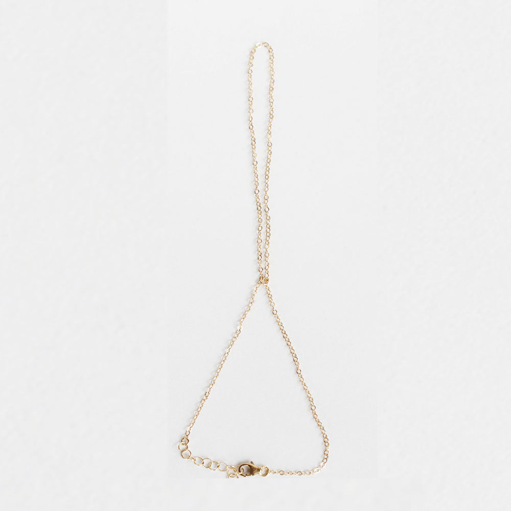 The simple gold handchain.   Simple, elegant, and durable.  Wear this on the daily.  Handmade.  Chains by Lauren
