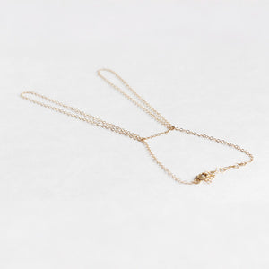 Delicate gold handchain available in gold fill and sterling silver.  Super simple and easy to wear on the daily.  Chains by Lauren
