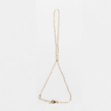 The simple gold handchain.   Simple, elegant, and durable.  Wear this on the daily.  Handmade.  Chains by Lauren