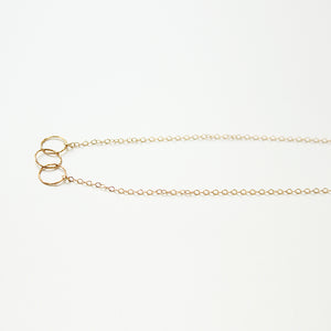 Dainty and delicate 3 ring gold necklace.  Handmade.  Chains by Lauren