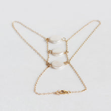 This fresh water pearl handchain is adjustable.  One size fits all.