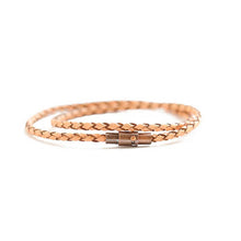 Thin beige wrap leather bracelet. Secures with a magnetic closure and a safety lock. . Chains by Lauren
