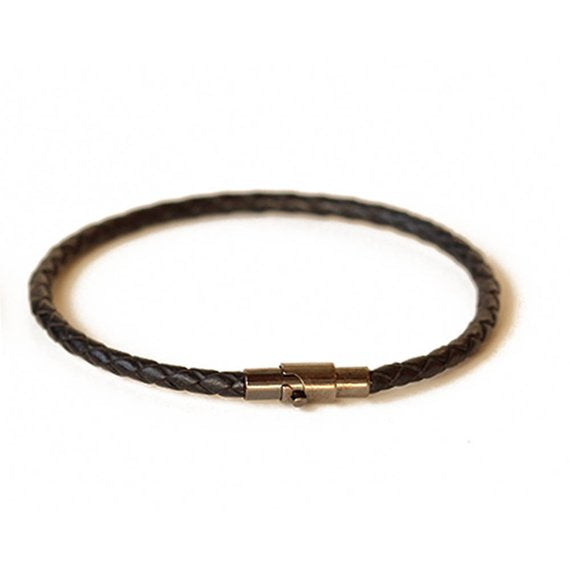 This men's black leather wrap bracelet has a gunmetal magnetic closure.  The magnetic closure makes it easy to snap on the bracelet without the help from others.