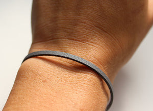Slate blue thin leather bracelet.  Chains by Lauren