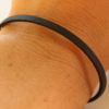 Unisex thin black leather bracelet secure magnetically with a safety lock.  Chains by Lauren