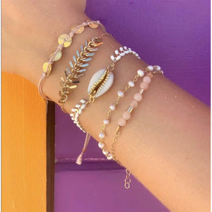 Stackable Chains by Lauren bracelets.  Including the rose quartz bracelet.  Made with gold fill and rose quartz.  Adjustable so one size fits all.  Chains by Lauren