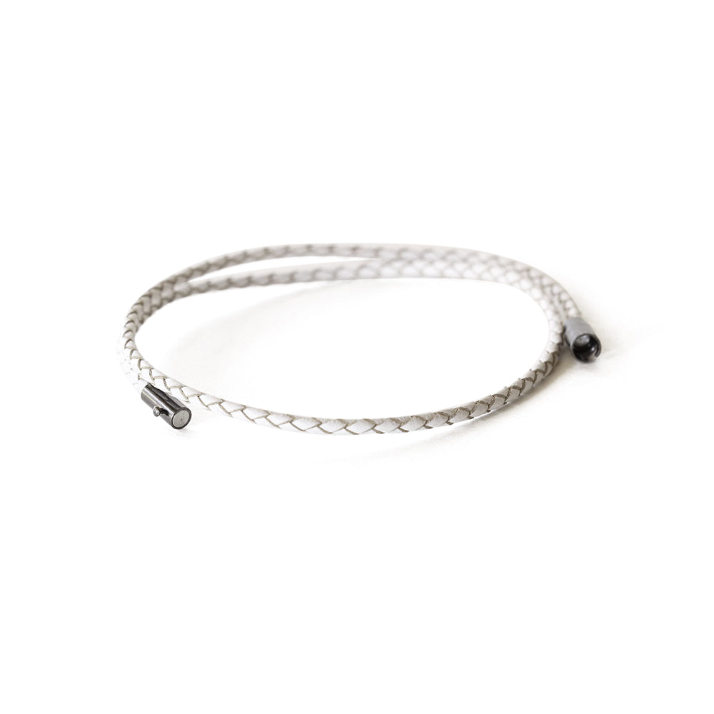 Men's white leather wrap bracelet with a magnetic closure.