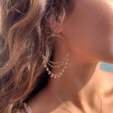 Dangle pearl hoops made with fresh water pearls and gold fill.  Handmade.  Chains by Lauren