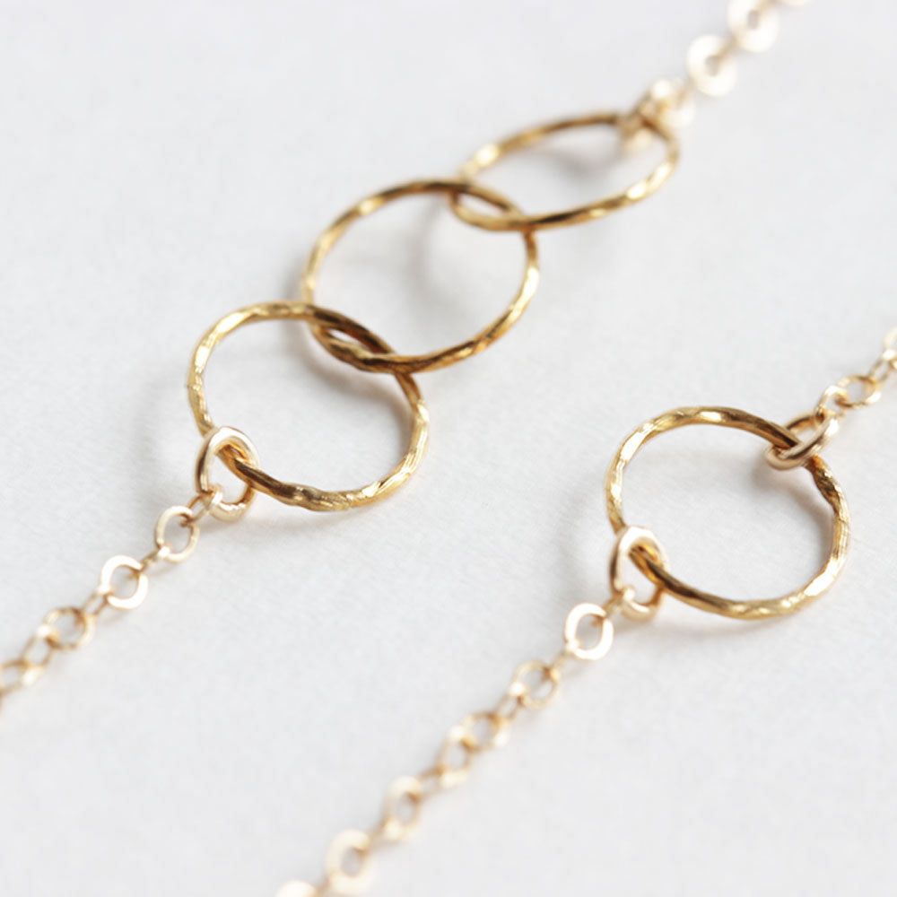 Momma and me bracelet set.  The daughter wears the single circle and the daughter wears the 3 circles.  Handmade.  Chains by Lauren