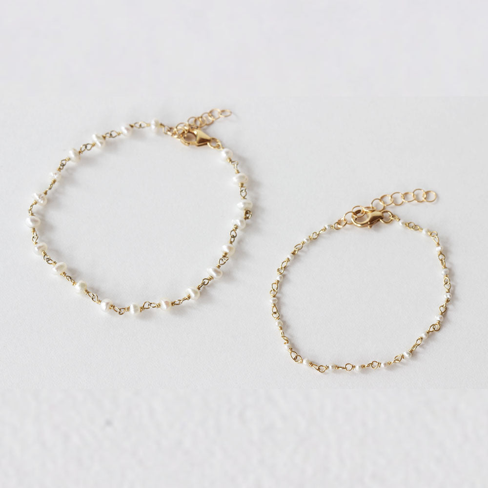 Mother and daughter pearl bracelet set made from fresh water pearl.  Choose from a rang of sizes for a 1 to 10 year old.  Handmade with love.  Chains by Lauren